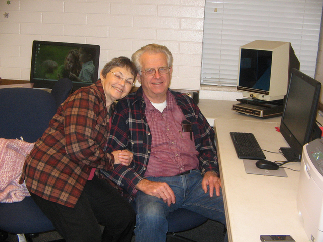 Linna and Andy Barnum share a family moment at the Pahrump FamilySearch Center where they volunteer while researching their own family roots. The center is located at 921 Wilson Road in the buildi ...
