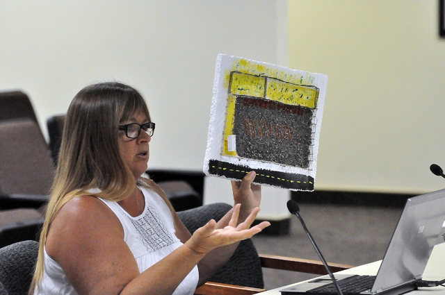 Horace Langford Jr / Pahrump Valley Times
Linda Hatley, member of the Pahrump Land Advisory Committee, shows Nye County commissioners a model of the proposed trailhead and dog park at 9301 S. Home ...