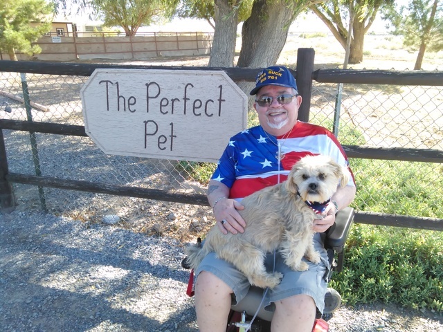 Retired Navy Veteran Dennis “Doc” Watkins prepares to take his new best friend ‘Lil Dude’ to a local groomer on Thursday. Watkins, who recently lost his cat of 17 years said he and the dog ...