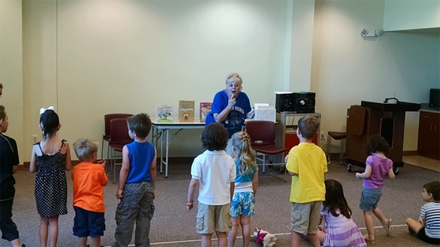 Pahrump Community Librarian Brenda Gibbons interacts with children during the library’s annual Summer Reading Program in June 2015. Tuesday's summer read was the last one for Gibbons, who plans  ...