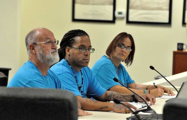 Mike Maye, center, talks to the Nye County Commission on Aug. 2 with David and Susan Gresham about the Light in the Dark Pumpkin Fest at Ian Deutch Memorial Park planned for October.
Horace Langfo ...