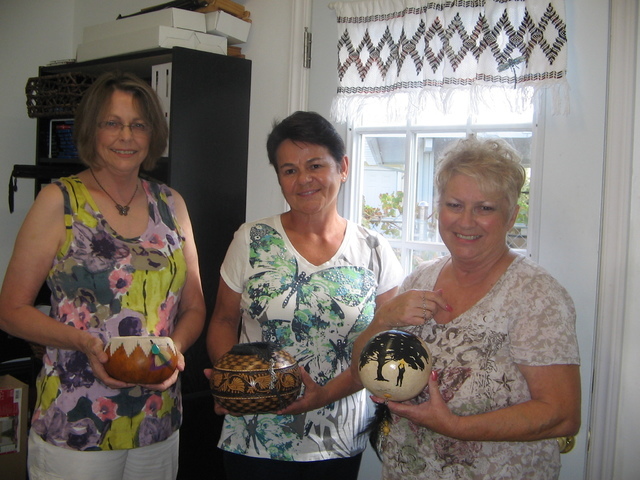 Gourd Goddesses, from left, Patti Jo Newsom, Jocelyne Lussier and Sherry Rhine display some of their gourd artwork. They are members of the Pahrump Valley Gourd Patch recently started by Newsom wh ...