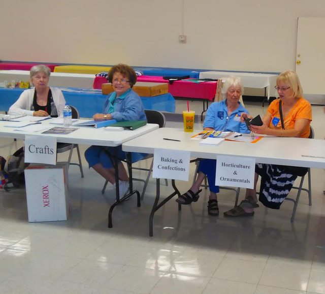 The Pahrump Fall Festival Arts and Crafts Committee prepare Tuesday to take entries for judging on Thursday. The event will take place inside the Bob Ruud Community Center beginning on Friday, Sep ...