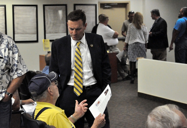 Horace Langford Jr./Pahrump Valley Times  
State Attorney General Adam Laxalt chats with Pahrump resident during his “AG for a Day” stop in Pahrump on Wednesday. Several members representing v ...