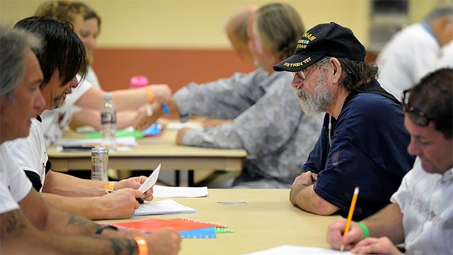 A southern Nevada veteran speaks to social service workers during a Veterans Stand Down in Clark County. Next Saturday, Pahrump’s homeless veteran can take advantage of numerous services provide ...