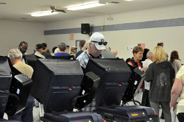 Horace Langford Jr. / Pahrump Valley Times
Voters cast their ballots during a busy General Election morning on Tuesday at Bob Ruud Community Center. Ten of Pahrump's 19 precincts vote at Ruud, wit ...