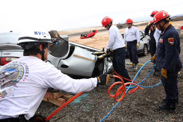 The Nevada Urban Search & Rescue Task Force during a rescue drill in 2013. FEMA-designated disaster response team will be involved in a large scale Nevada/California earthquake preparedness dr ...