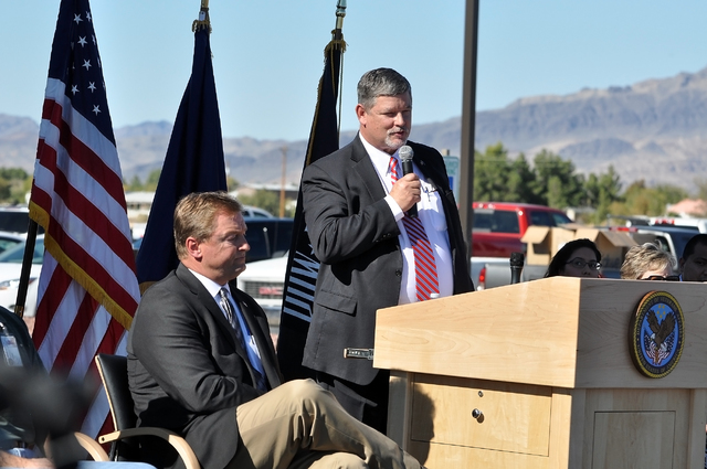 Horace Langford Jr. / Pahrump Valley Times 
U.S. Sen. Dean Heller listens to state Assemblyman James Oscarson addresses the estimated 200 attendees at the ribbon cutting Thursday for the VA Pahrum ...