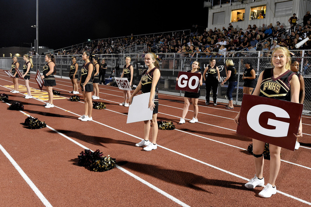 Peter Davis / Special to the Pahrump Valley Times
The 2016 cheer team cheers on the Trojans.