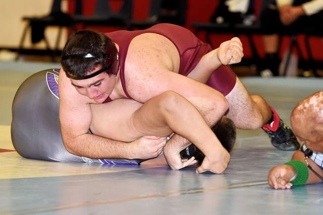 Peter Davis Special to the Pahrump Valley Times
Senior Jeremy Albertson (220 pounds) works over his opponent and gets a pin.