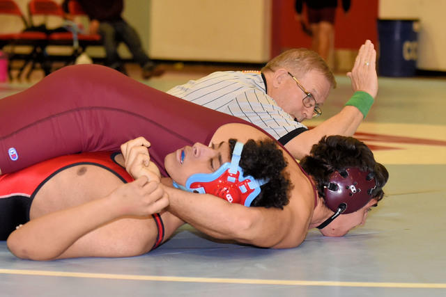 Peter Davis / Special to the Pahrump Valley Times
Senior Garrett Monje (170 pounds) pins his Western opponent on Dec. 13.