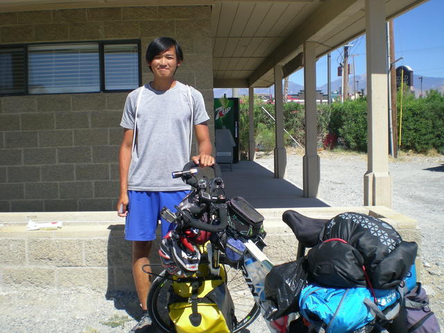 Chung Lee has everything he needs to ride across the country strapped to his bike. He is a 23-year old tourist from Hong Kong is on a grand adventure to see America. Vern Hee/Pahrump Valley Times