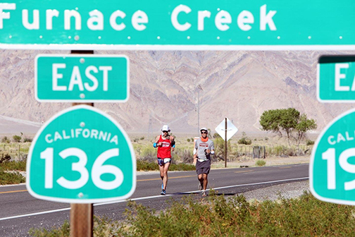 Trasie Phan Special to the Pahrump Valley Times
Above, Pete Kostelnick runs with crew member  Kyle Clouston. Kostelnick is the 2016 winner of the Styr Labs Badwater 135 joins an elite number of ru ...