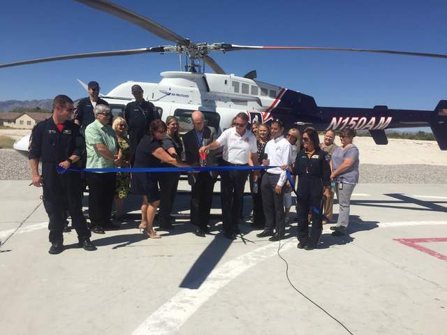 Desert View Hospital CEO Kelly Adams cuts the ribbon to christen in the Mercy Air's Airbase 24 located at the hospital.

Mick Akers/Pahrump Valley Times