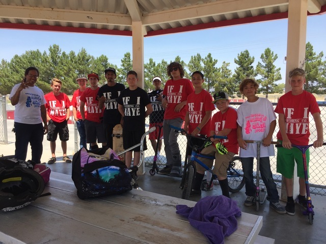 Mike Maye, a local business owner of If I Maye Clothing Co, hands out free T-shirts to the kids at the skate park to let them know that he is raising money for renovations at the park.