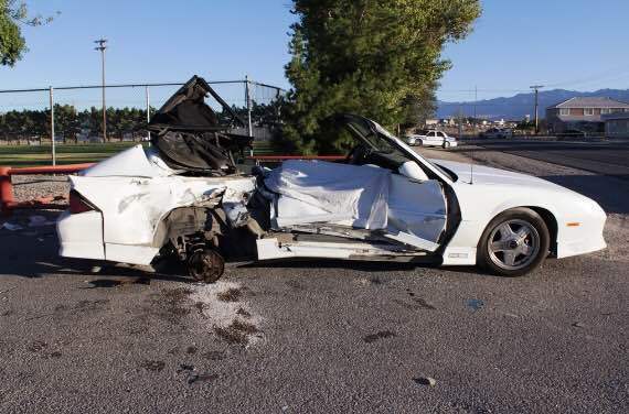 The white Chevrolet Camaro that the two victims were traveling was heavily damaged on the passenger side, where Ashley Weir was sitting when the crash occurred.

Special to the Pahrump Valley Times.
