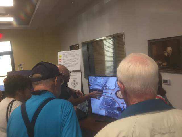 Pahrump Valley residents are shown how to properly navigate through a roundabout at the Nevada Department of Transportation's public workshop Thursday. 

Mick Akers/Pahrump Valley Times