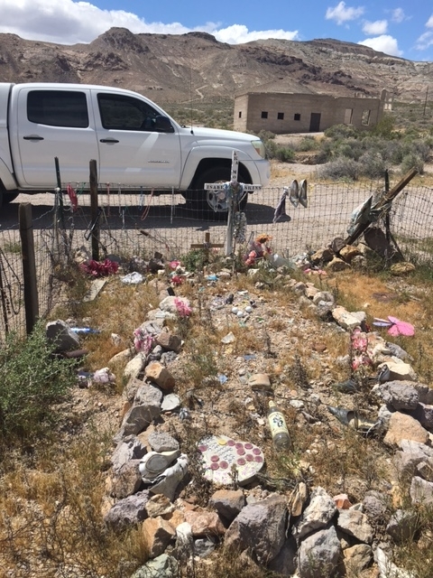 A view of the ruins of the jailhouse that held Fred Skinner, with the grave of his murder victim, Mona Bell, in the foreground. 
Helene Campton/Special to the Pahrump Valley Times
