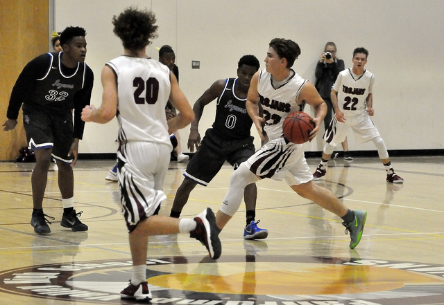 Parker Hart tries to penetrate the Desert Pines defense on Monday. 
Horace Langford Jr. / Pahrump Valley Times
