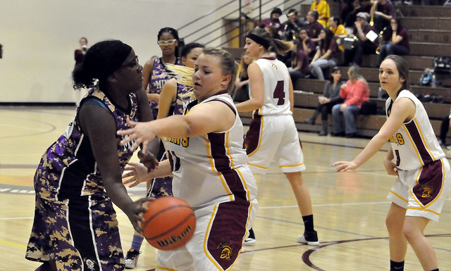 Jordan Egan works on defense to prevent a pass by an opponent on Tuesday. Egan is known for her high energy and intense play. 
Horace Langford Jr. / Pahrump Valley Times