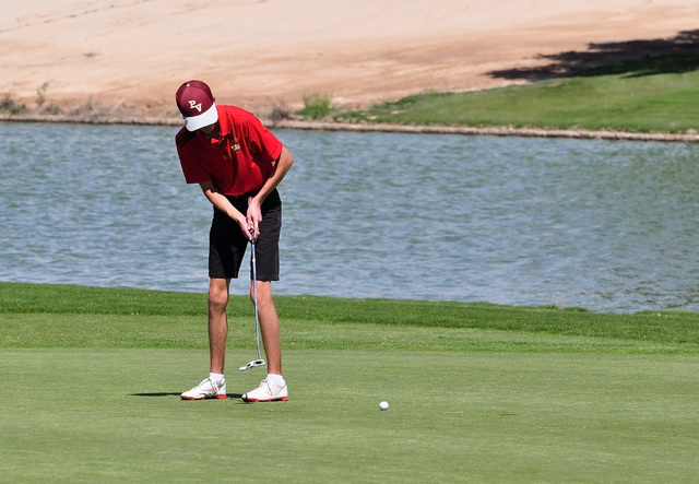 Horace Langford Jr / Pahrump Valley Times

Former Trojans golfer Derek Moore putting conventionally on the green at Mountain Falls. Anchored putting was only used the by 15 percent of the golfers.