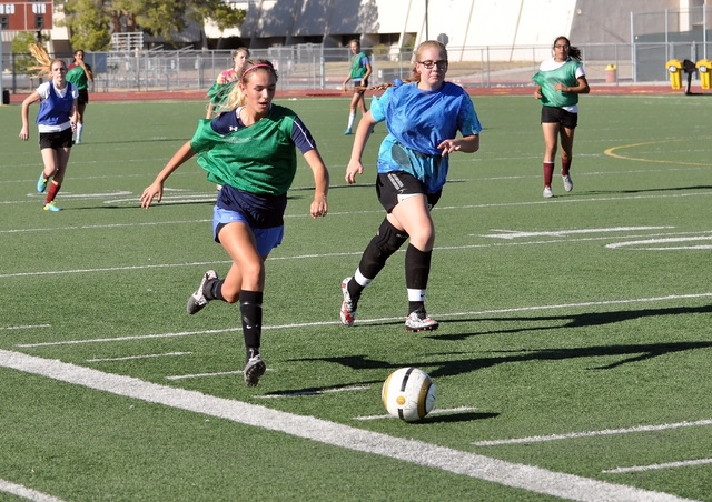 Horace Langford Jr. / Pahrump Valley Times 

Vaniah Vitto and Megan Kral race to the ball in a scrimmage before the season.