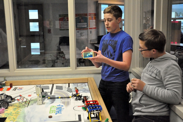 Horace Langford Jr. / Pahrump Valley Times 
Seventh grade RCMS student, Zach King, explains how his team won the robot competition on Dec. 3 at West Career and Technical Academy in Las Vegas. The  ...