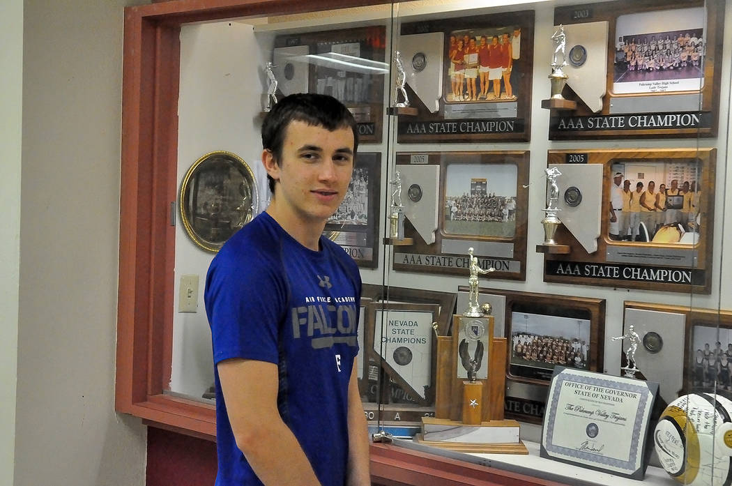 Joey Sladek admires the trophies in the trophy case at Pahrump Valley High School. The senior kicker will be entering the Air Force Academy in the fall. He was accepted on Dec. 3. 
Horace Langford ...