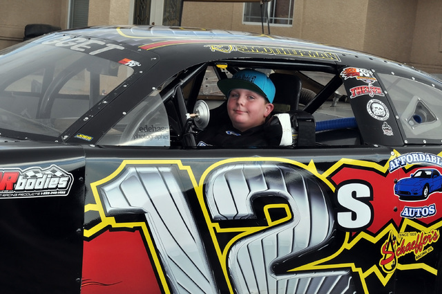 RJ Smotherman sits in his Junior Late Model Series car in front of his home in Pahrump. Once a month, Smotherman gets to drive the 500-horsepower beast at Madera Speedway in California.
Horace Lan ...