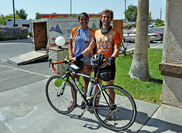 Horace Langford Jr / Pahrump Valley Times 

Texas 4000 riders Geetika Rao and Matthew Schneider pose with Schneider’s Scott Bike. The Texas 4000 got a deal on the bikes from a local Texas bike d ...