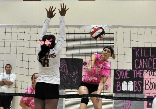 Horace Langford Jr. / Pahrump Valley Times 
Alexis Trieb gets some net on this ball. She got a little frustrated but in the end she had 23 kills to help the Trojans win.