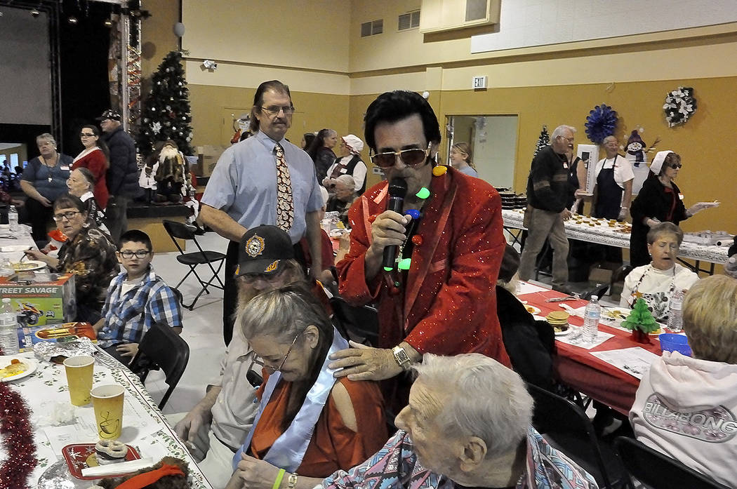 Horace Langford Jr./Pahrump Valley Times
Pahrump's own Elvis Presley impersonator Johnny V entertains attendees during NyE Communities Coalition's Christmas Day Brunch on Monday. The event is host ...