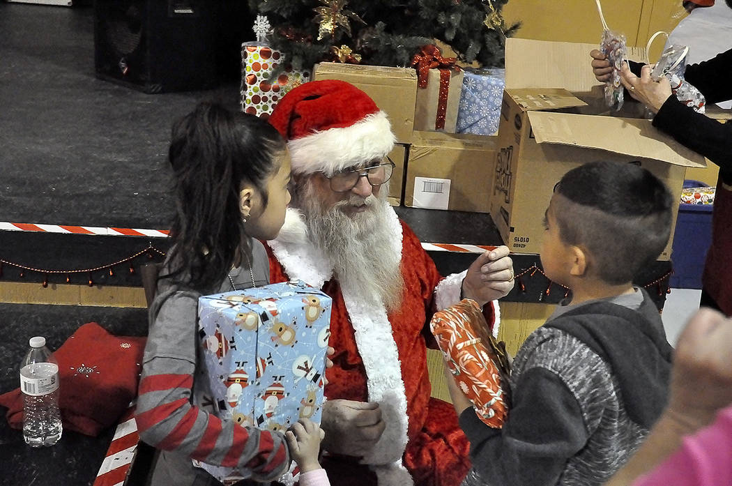 Horace Langford Jr./Pahrump Valley Times
Following a very long and busy Christmas Day, Santa Claus still had the time, energy and presents to make a special appearance at the Holiday Task Force's  ...