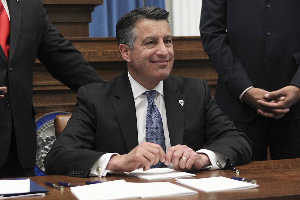 Gov. Brian Sandoval before signing a group of bills while at the Nevada State Capitol Building in Carson City on Monday, June 5, 2017. Chase Stevens Las Vegas Review-Journal @csstevensphoto