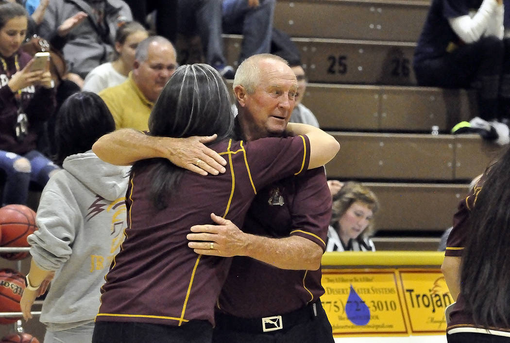 Horace Langford Jr./Pahrump Valley Times 
Pahrump Valley girls basketball Coach Bob Hopkins receives hug in celebrating his 500th win on Monday night. In 2016, Hopkins returned to the basketball c ...