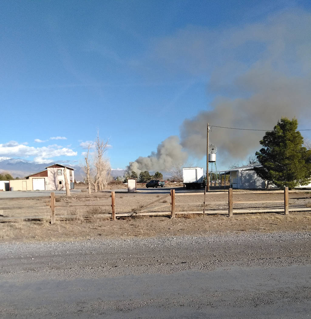 Selwyn Harris/Pahrump Valley Times 
Thick black smoke could be seen throughout the Pahrump Valley, indicating a working structure fire. According to Nye County dispatchers and fire crews, oxygen t ...