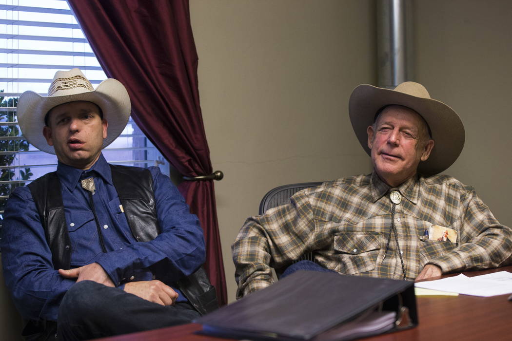 Ryan Bundy, left, and his father, Bunkerville rancher Cliven Bundy, at the office of defense attorney Bret Whipple in downtown Las Vegas on Tuesday, Jan. 9, 2018. Federal charges against Ryan and  ...