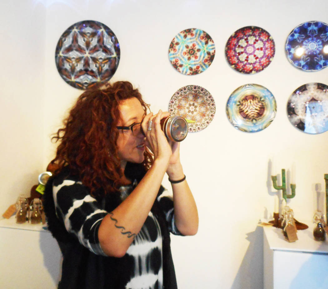 Robin Flinchum/Special to the Pahrump Valley Times
Artist Judyth Greenburgh demonstrating one of her kaleidoscopes at the Tecopa Artists Group Gallery. Later this month is the Tecopa/Shoshone arts ...