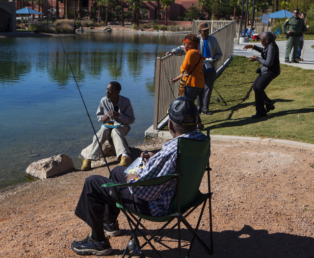 Miranda Alam/Las Vegas Review-Journal 
Attendees fish during a senior fishing derby in 2016 in Southern Nevada. Fishing is available in multiple spots around the region.