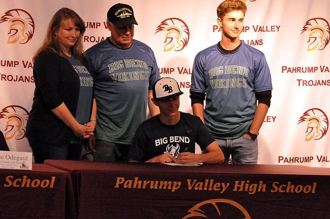 Horace Langford Jr./Pahrump Valley Times
Baseball player Garrett Lucas is joined by his family Wednesday at Pahrump Valley High School at an event marking Trojan athletes signing National Letters  ...