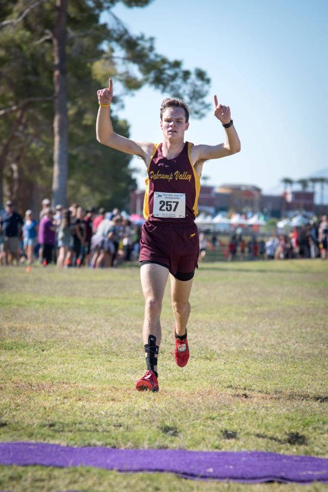 Special to the Pahrump Valley Times
Bryan Odegard crosses the finish line to win the 2016 state 3A cross-country championship. Odegard was the first Pahrump Valley runner to win a state cross-coun ...