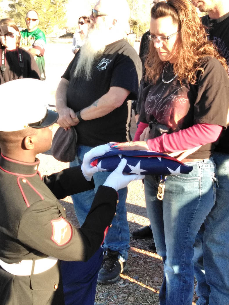 Selwyn Harris/Pahrump Valley Times
A Marine Corps Honor Guard from Las Vegas presents the American flag to Joanna Dawn Karle, daughter of longtime Pahrump veteran Bernard M. Mihalcean, 65, who pas ...