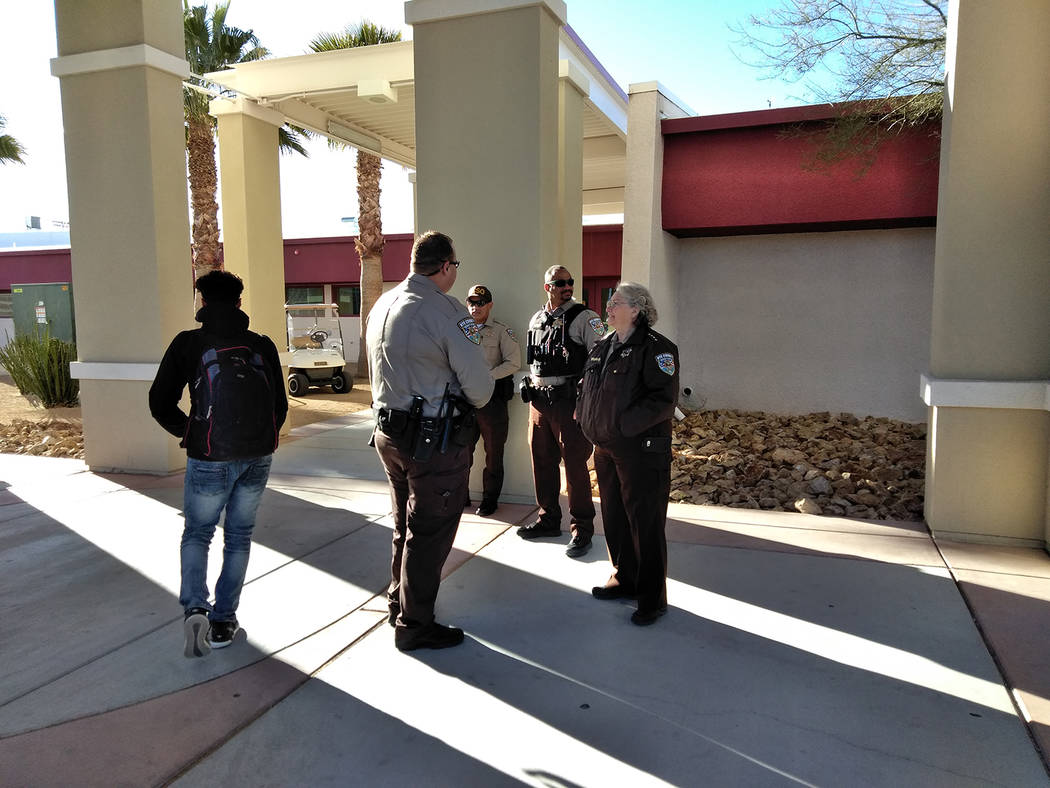 Selwyn Harris/Pahrump Valley Times
Nye County Sheriff Sharon Wehrly stands guard with deputies at the entrance of Pahrump Valley High School on Monday morning. An anonymous written threat directed ...