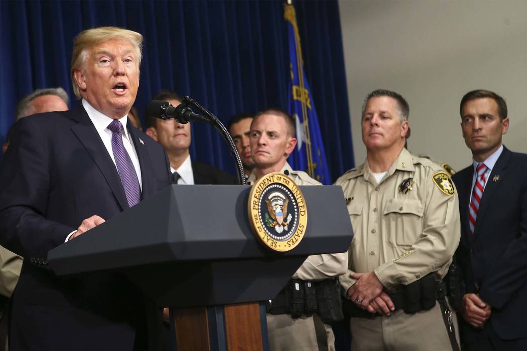 President Donald Trump speaks at Metropolitan Police Department headquarters in Las Vegas on Wednesday, Oct. 4, 2017. A gunman opened fire on attendees of a music festival Sunday night, resulting  ...