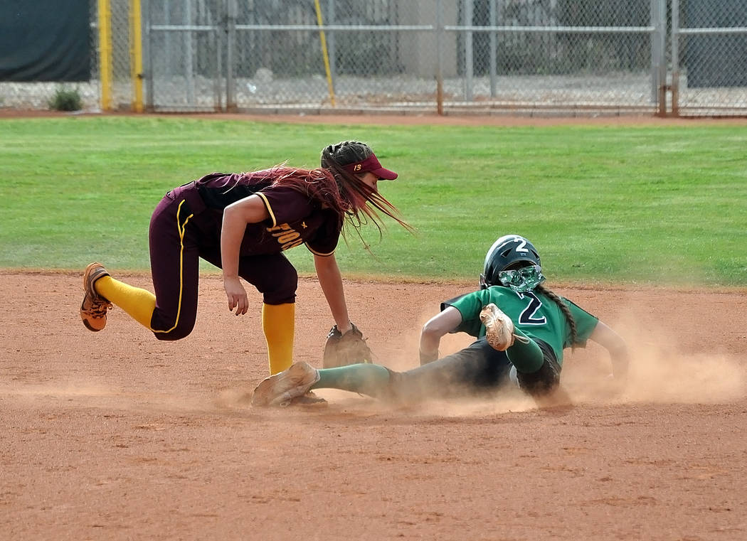 Horace Langford Jr./Pahrump Valley Times
Pahrump Valley second baseman Skyler Lauver hit a key single in the seventh inning Saturday and scored the winning run as the Trojans defeated defending st ...