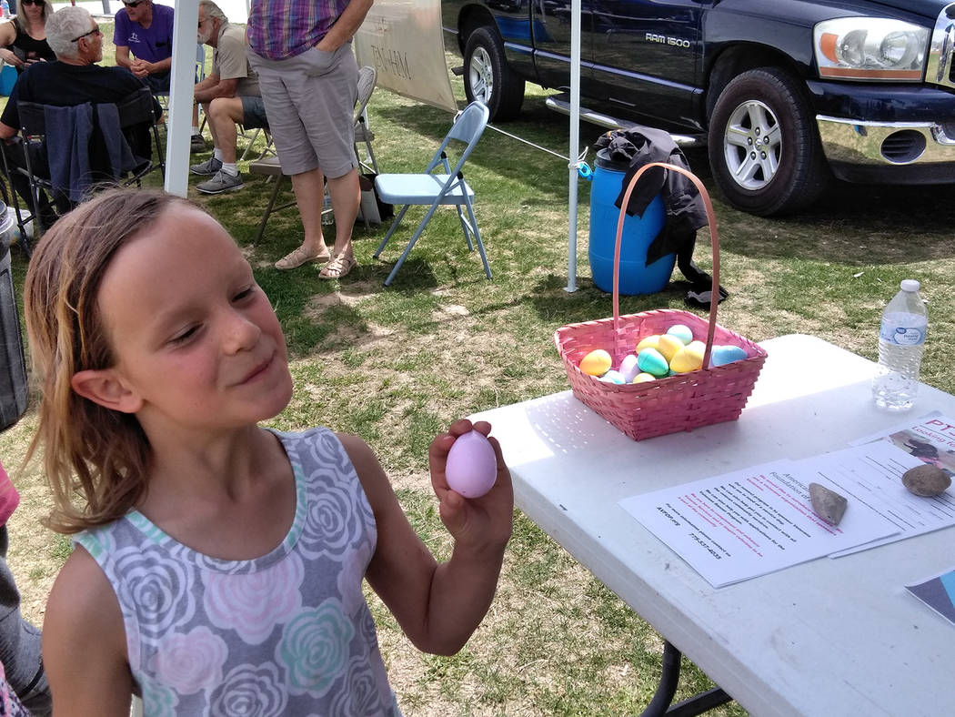 Selwyn Harris/Pahrump Valley Times
A young Easter Egg seeker covets the prized object provided by more than 20 organizations during Saturday's Community Easter Picnic. The free event attracted hun ...