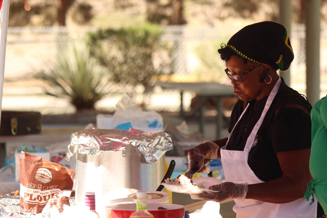 Jeffrey Meehan/Pahrump Valley Times Caribbean cuisine was served during the "One Love" music festival at Ian Deutch Memorial Park on May 12, 2018. The menu included jerk chicken, rice and other ta ...