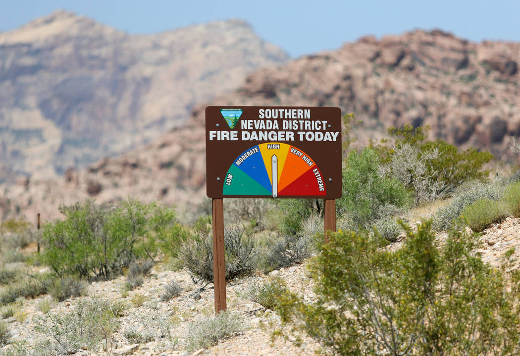 The National Fire Danger Rating System is shown as “high” on a sign posted along State Route 159 at Red Rock National Conservation Area Friday, June 3, 2016, in Las Vegas. (Ronda Chu ...