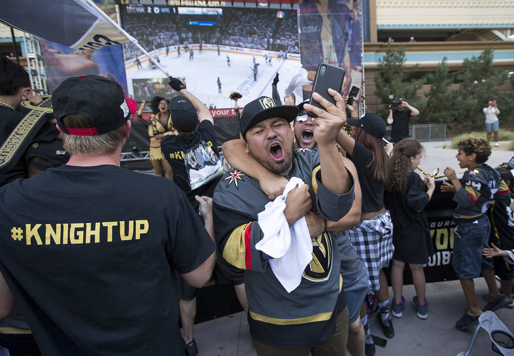 Richard Brian/Las Vegas Review-Journal Vegas Golden Knights fans celebrate during a watch party after the Knights defeated the Winnipeg Jets 2-1 in Game 5 of the Western Conference finals on Sunda ...