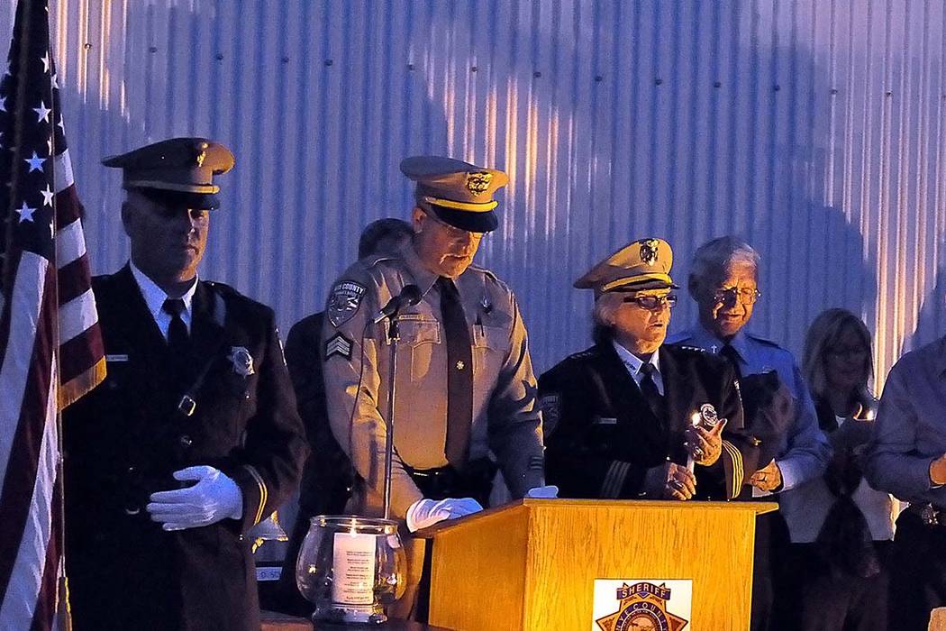 Horace Langford Jr./Pahrump Valley TimesNye County Sheriff's Sgt. Duane Downing, center at podium, takes part in a 2017 fallen officers ceremony in Pahrump.
